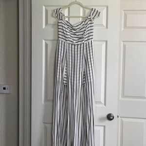 Women’s long drape dress. Black and white striped. Fits small.